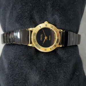 Cecil quartz watch women's goldtone and black lacquer stretch metal band
